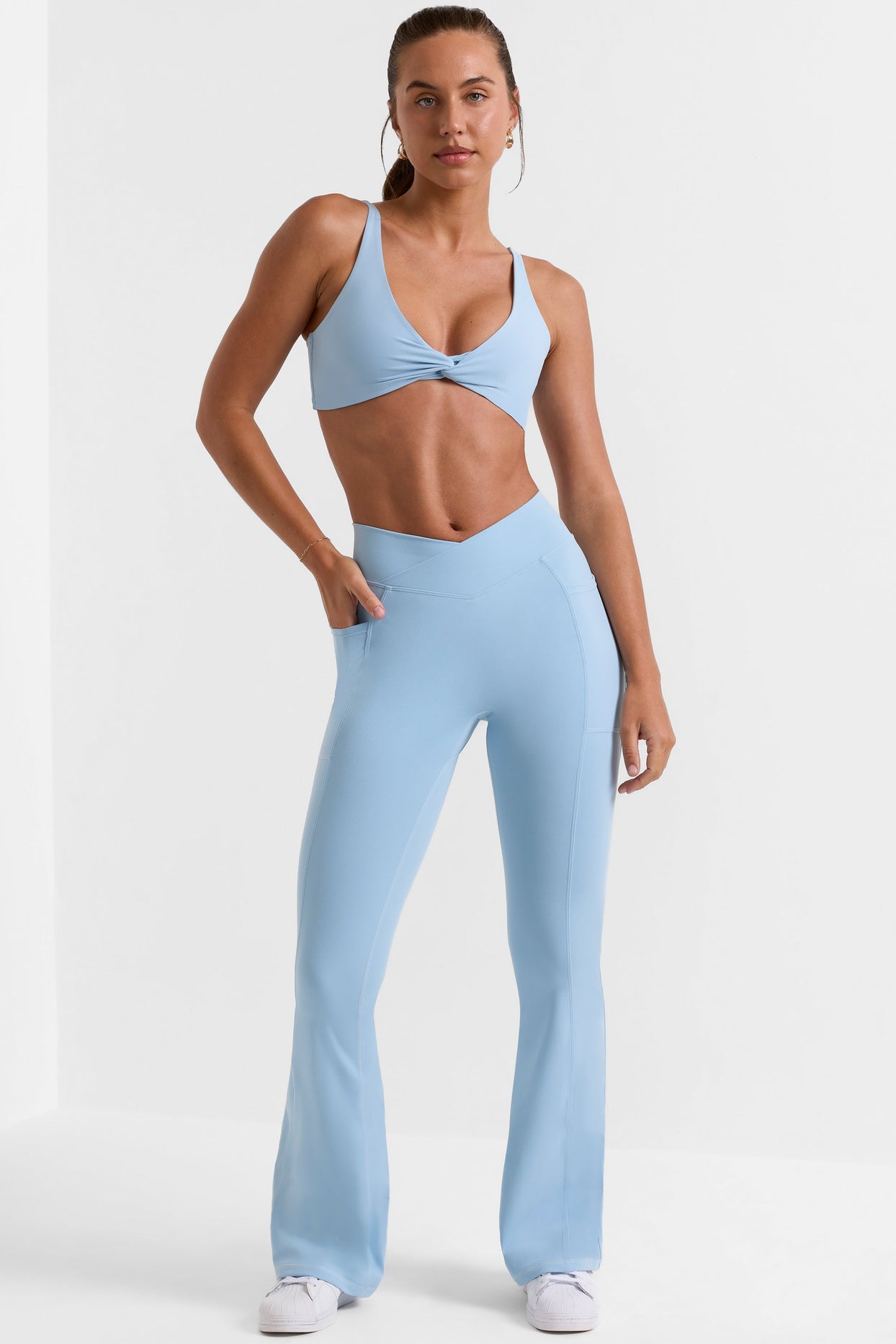 Cross Waistband Flare Pocket Leggings in Ice Blue