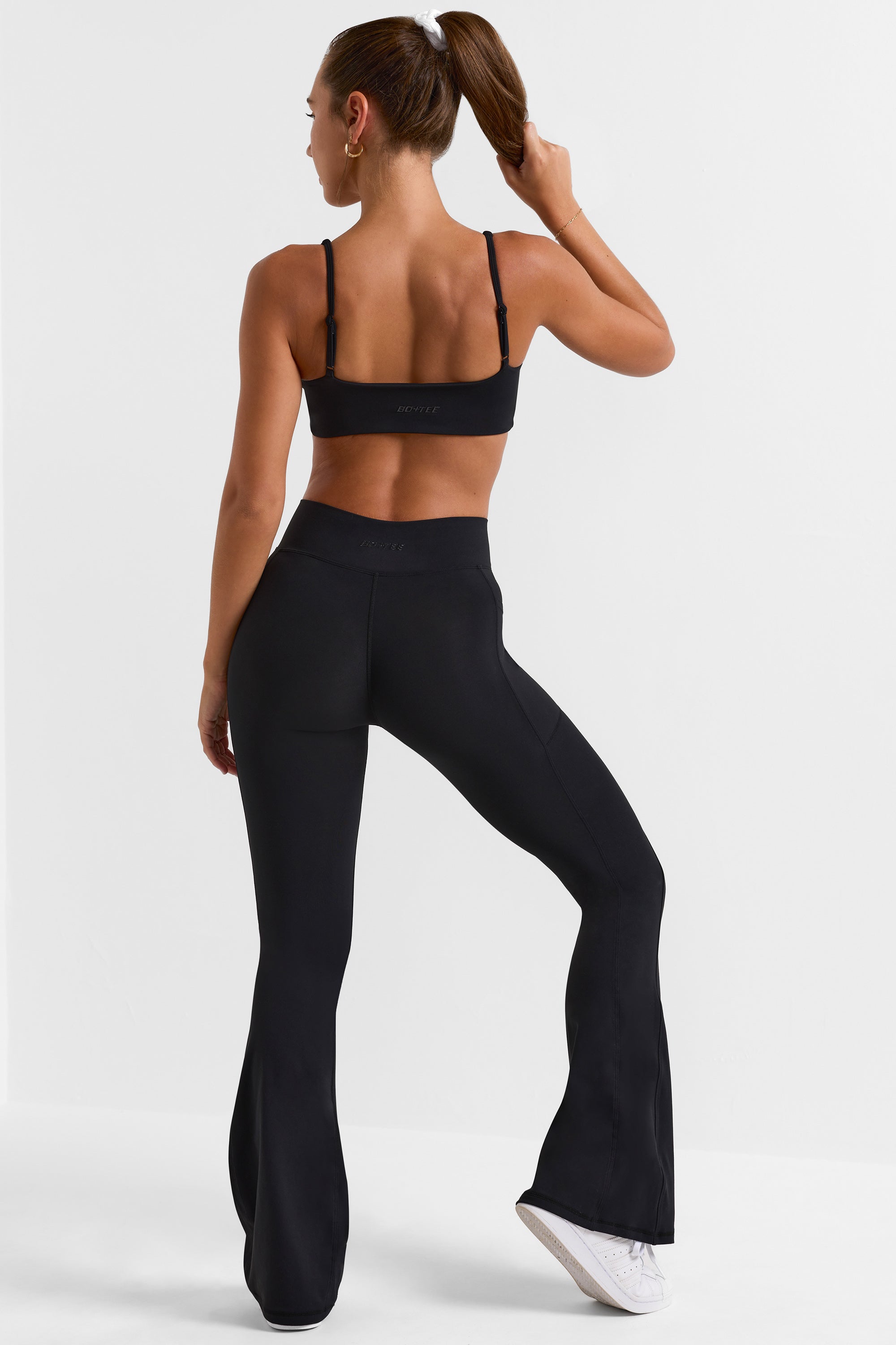 Petite Cross Waistband Flare Pocket Leggings in Black