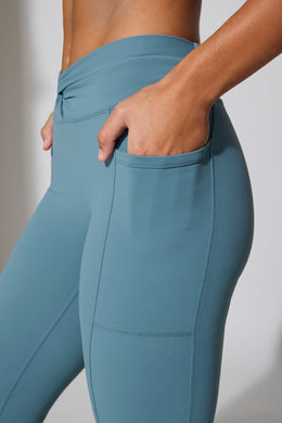 Twist Waist Flare Leggings in Slate Blue