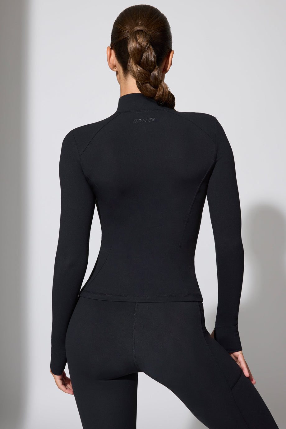 جاكيت طويل الأكمام بسحاب باللون الأسود