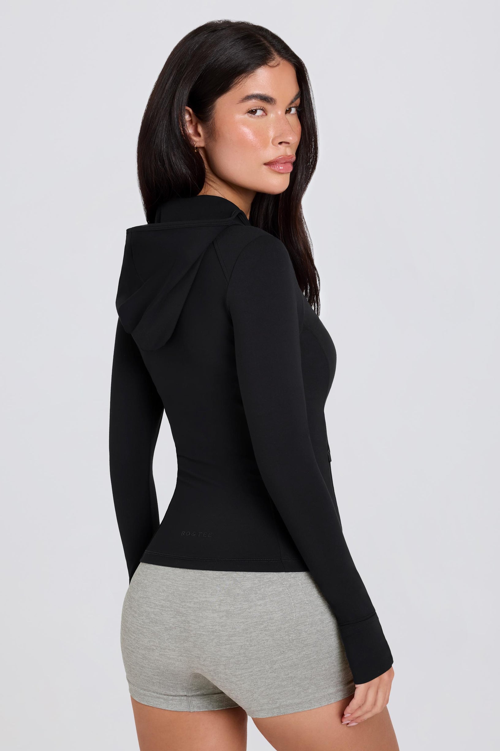 Soft Active Hooded Mid-Layer Jacket in Black - 1