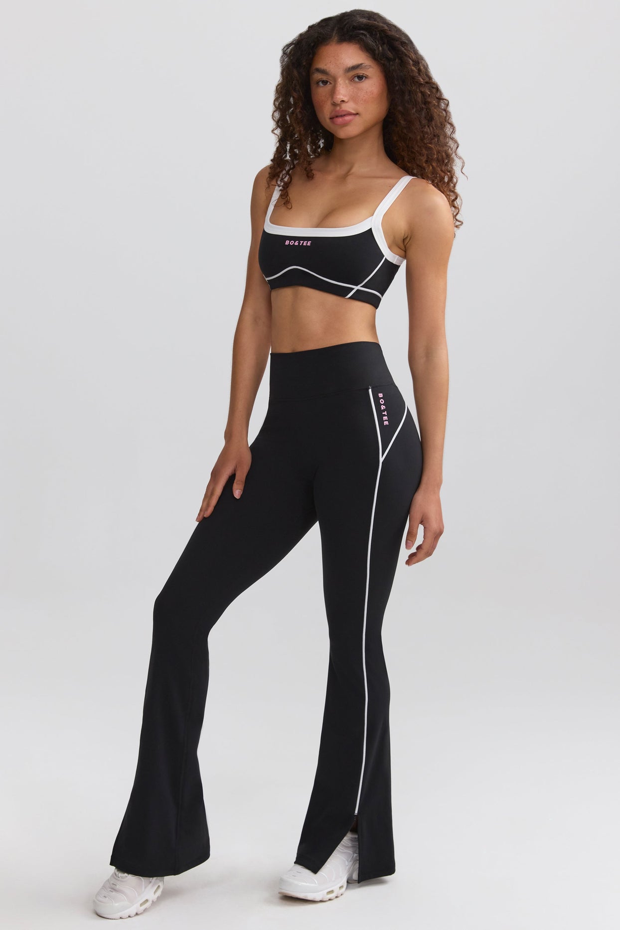 Petite Soft Active Contrast-Trim Flared Trousers in Black