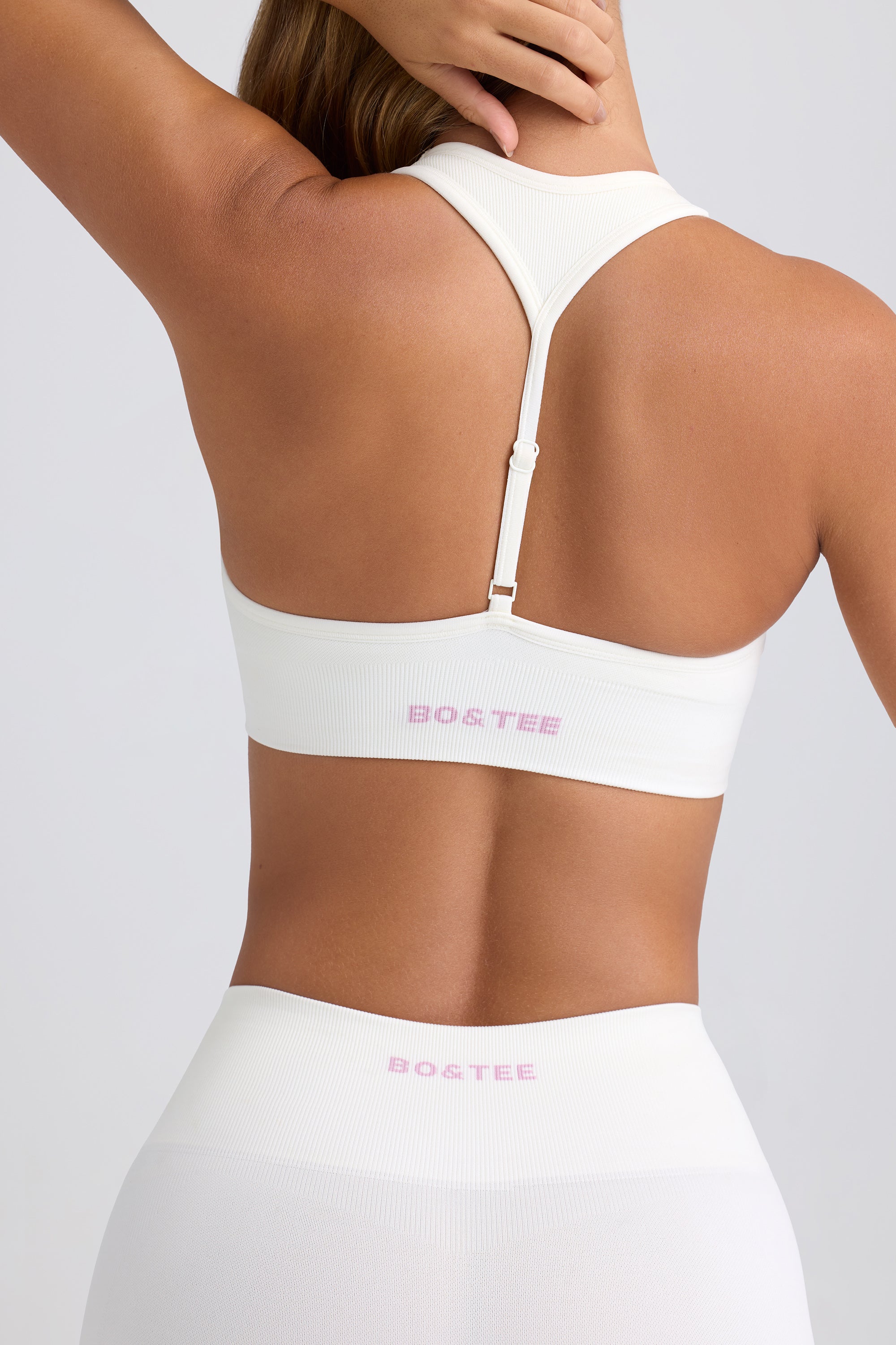 Super Sculpt Seamless T-Back Sports Bra in Eggshell