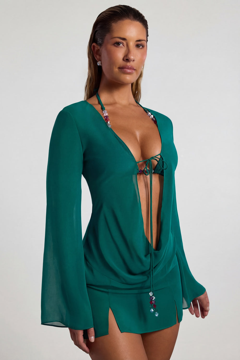 Oh Polly Swim's Sierra Skye wearing the Vista Mini Dress in Jade Green fabric perfect for beachside brunch