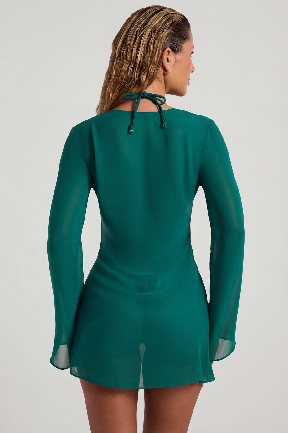 Oh Polly Swim's Sierra Skye wearing the Vista Mini Dress in Jade Green fabric perfect for beachside brunch