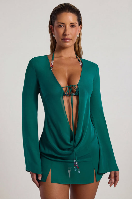 Oh Polly Swim's Sierra Skye wearing the Vista Mini Dress in Jade Green fabric perfect for resort lounging