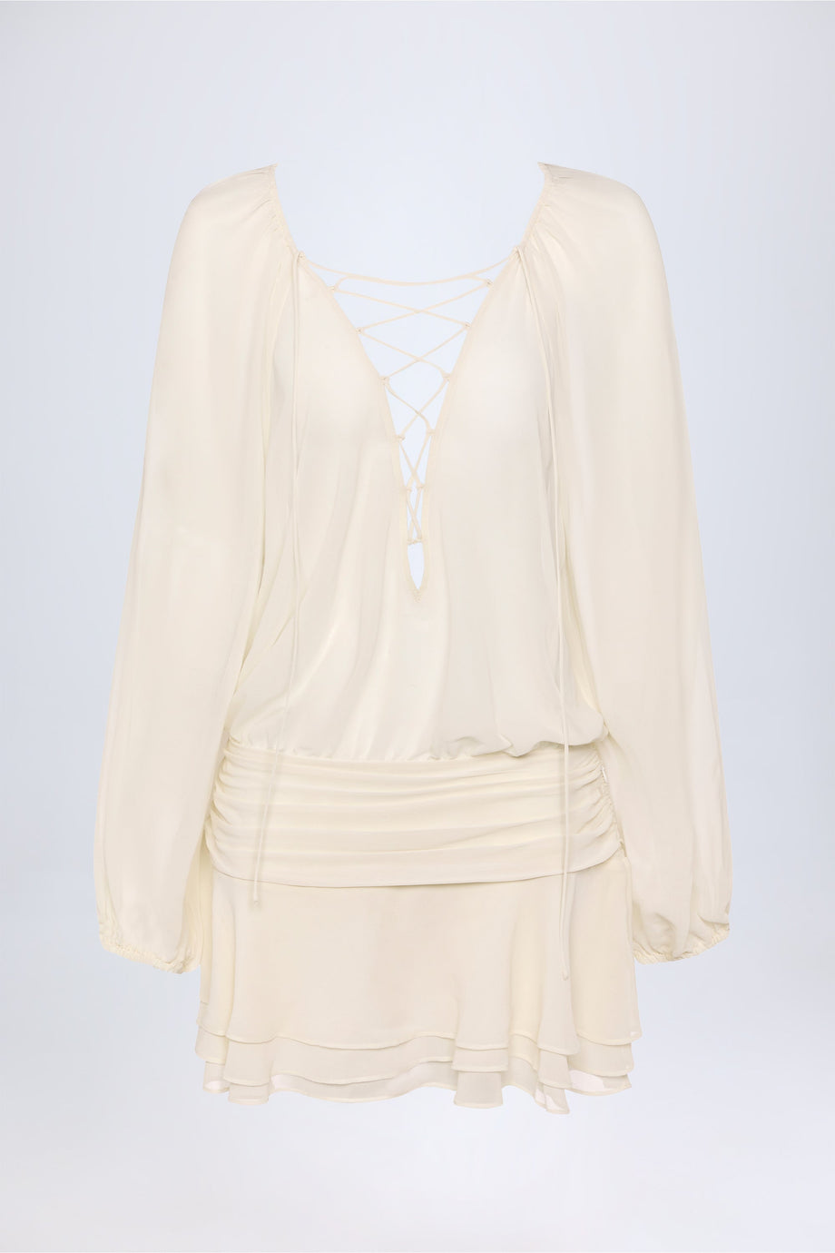 فستان عاجي بأكمام منفوخة وربطة عنق