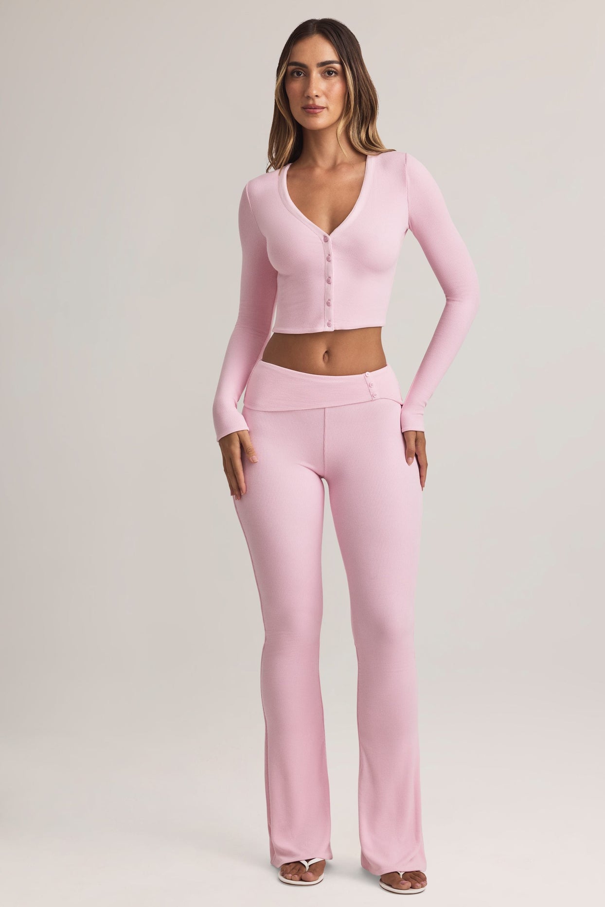 Bebe Modal Foldover Mid-Rise Flared Trousers in Pastel Pink Oh Polly
