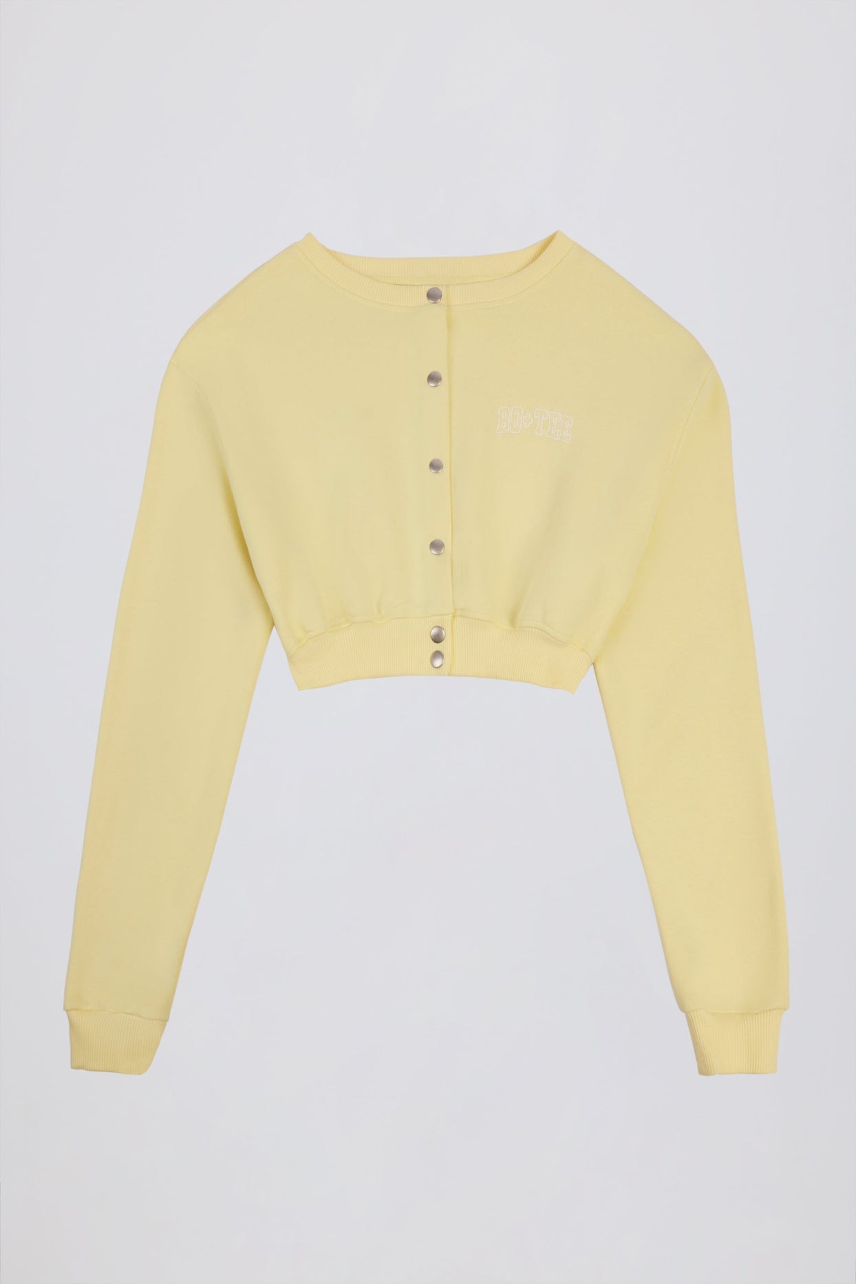 كارديجان قصير بأزرار باللون الأصفر الناعم