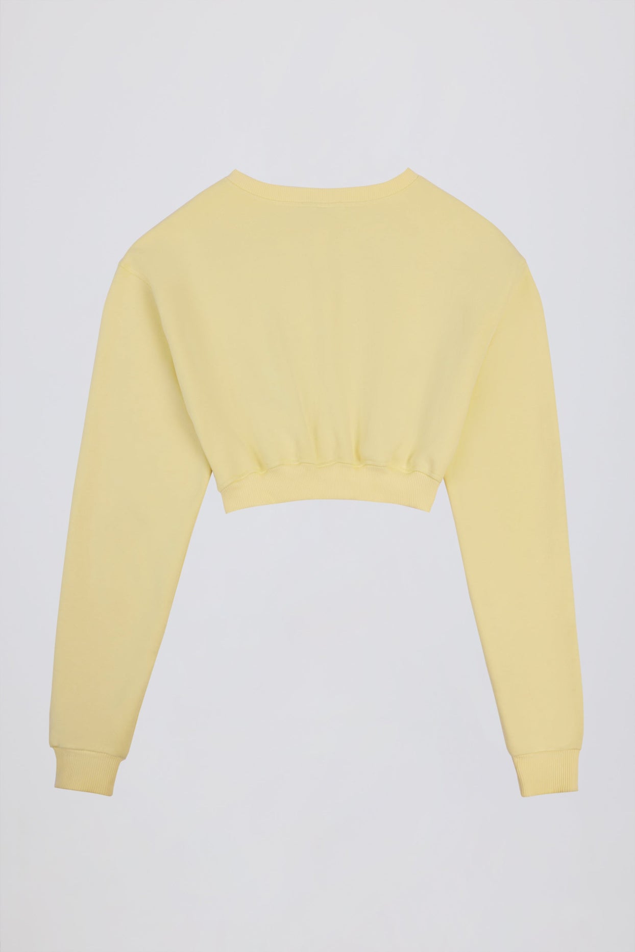 كارديجان قصير بأزرار باللون الأصفر الناعم