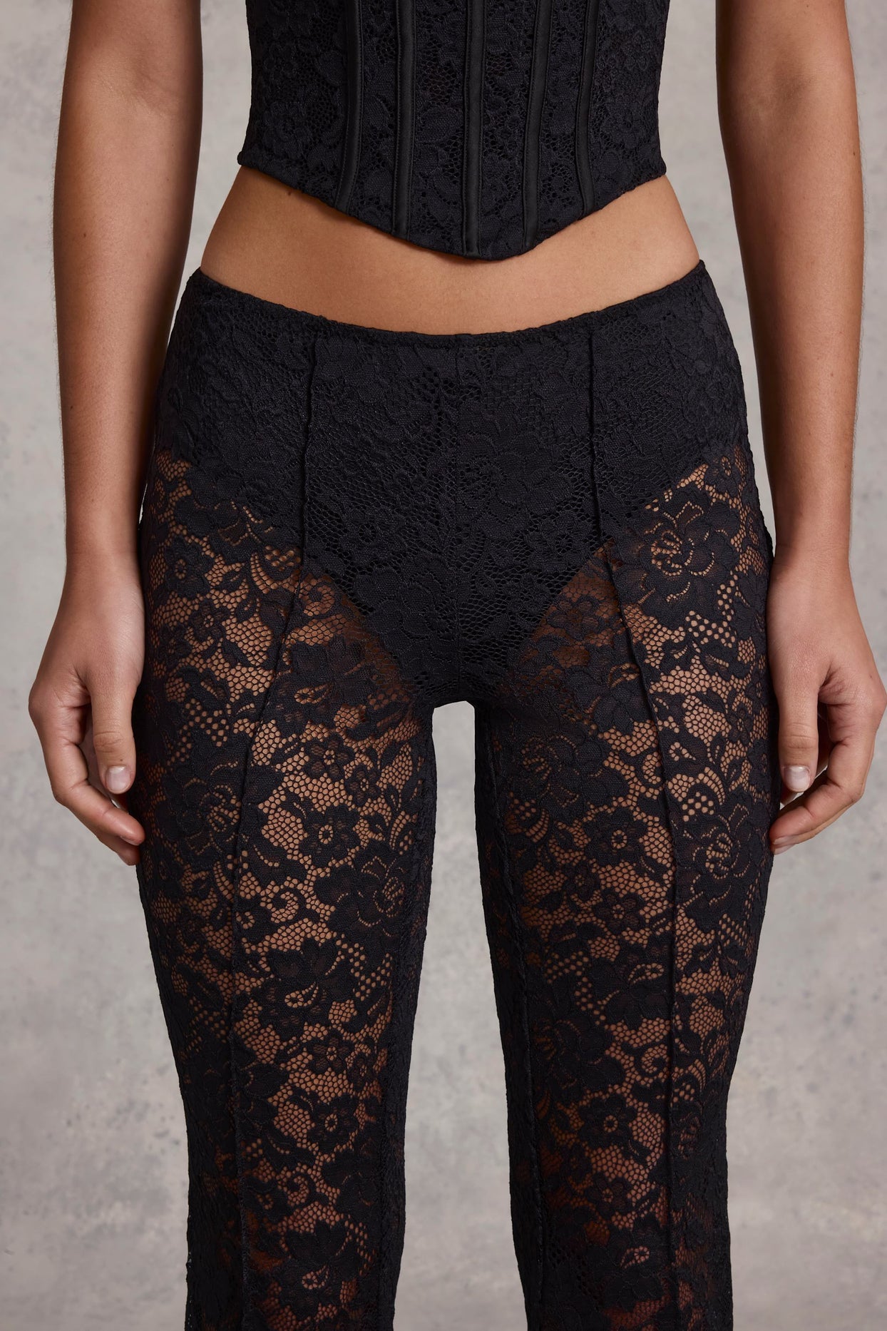 Mid-Rise Lace Flared Trousers in Black
