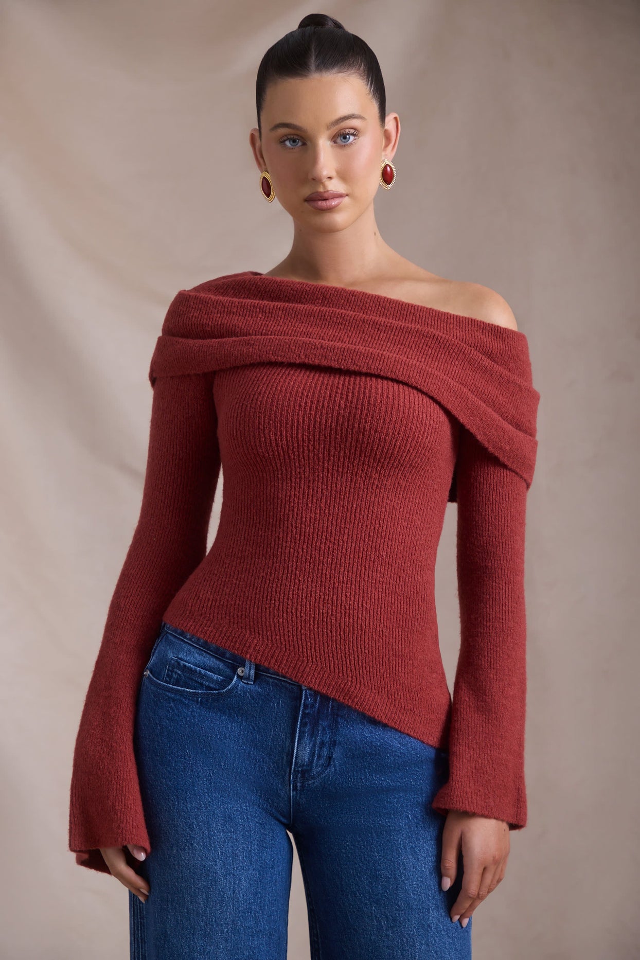 Ribbed-Knit Asymmetric Off-Shoulder Jumper in Brick Red