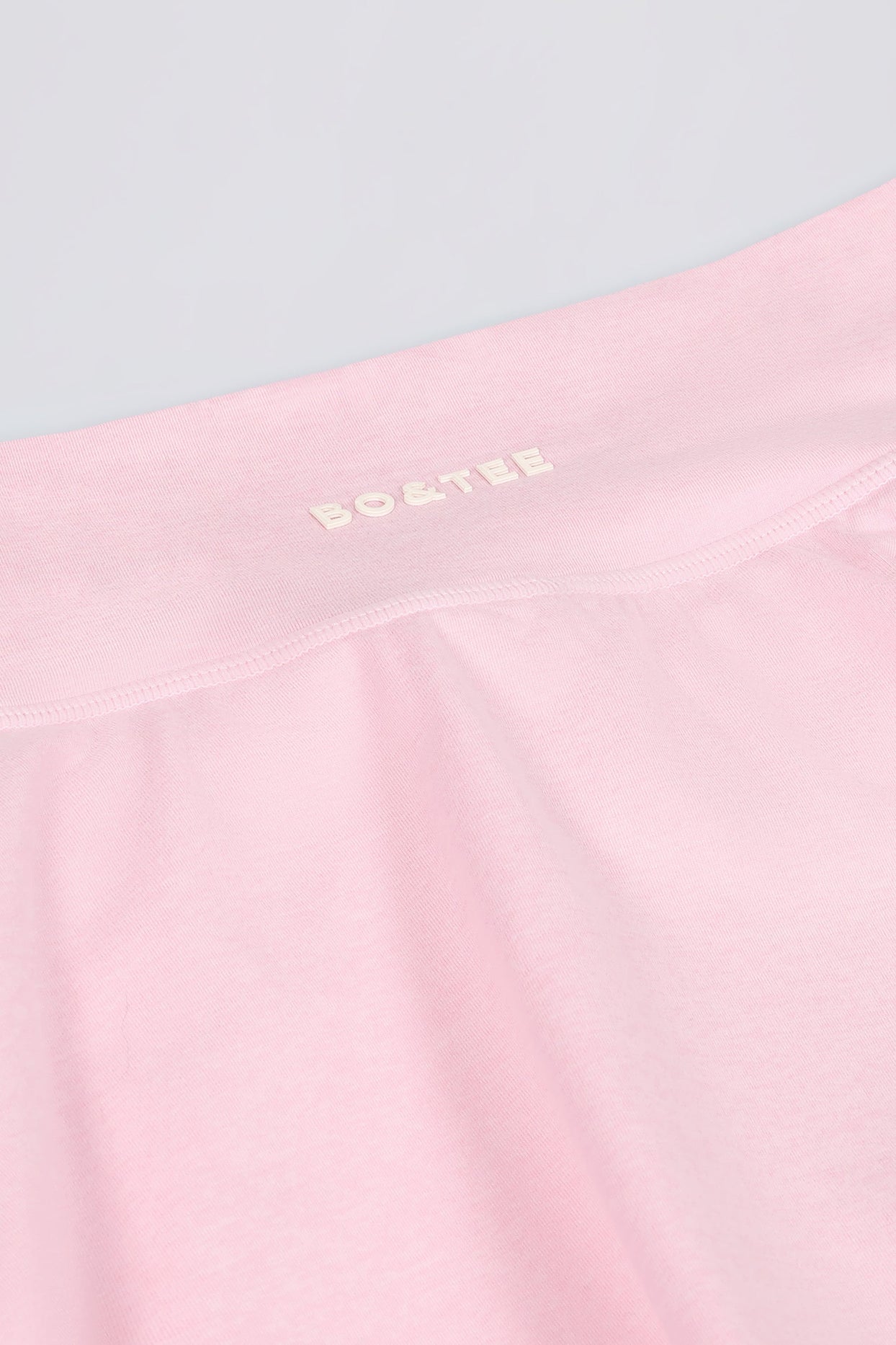 تنورة قصيرة متقاطعة بلون وردي باهت مارل