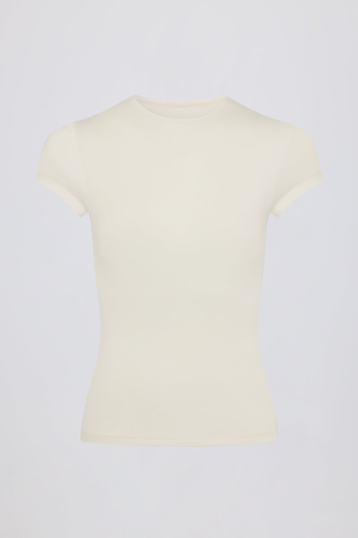 تي شيرت طويل بفتحات باللون الكريمي