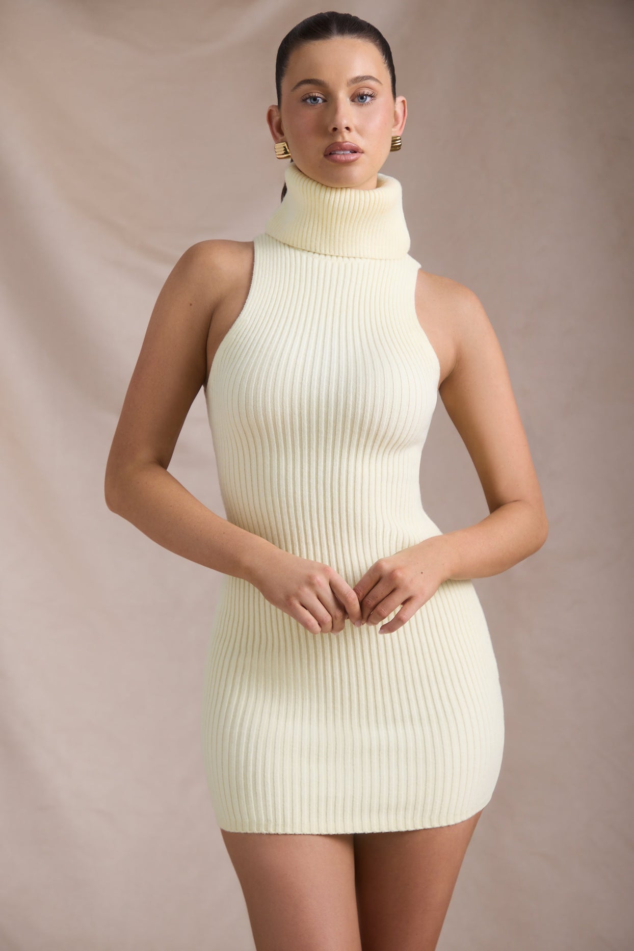 Ribbed-Knit Turtleneck Mini Dress in Butter Yellow Ribbed-Knit Turtleneck Mini Dress in Butter Yellow