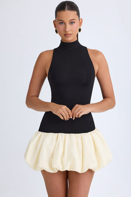 Turtleneck Drop-Waist Bubble Hem Mini Dress in Black