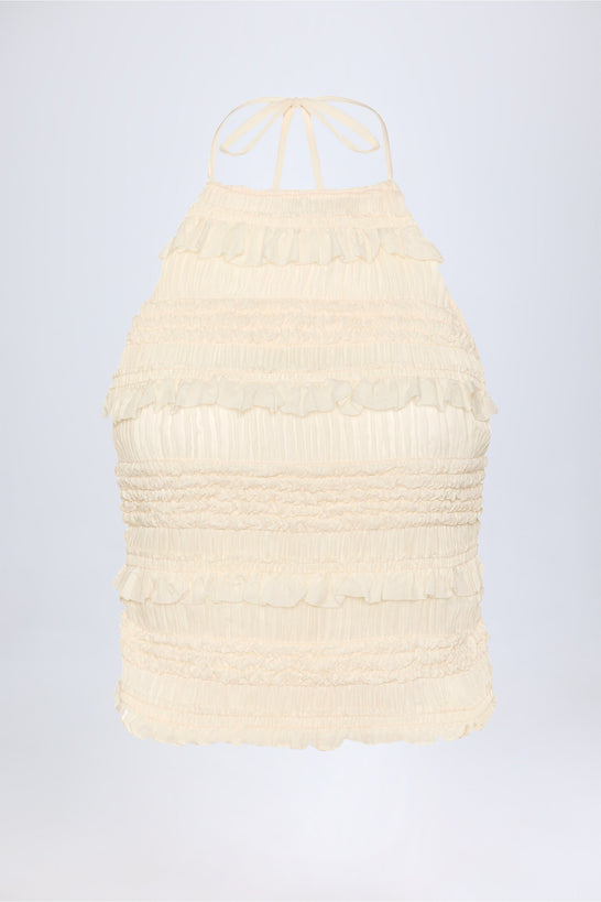 بلوزة مكشكشة، عالية الرقبة، مكشوفة الظهر، عاجي اللون