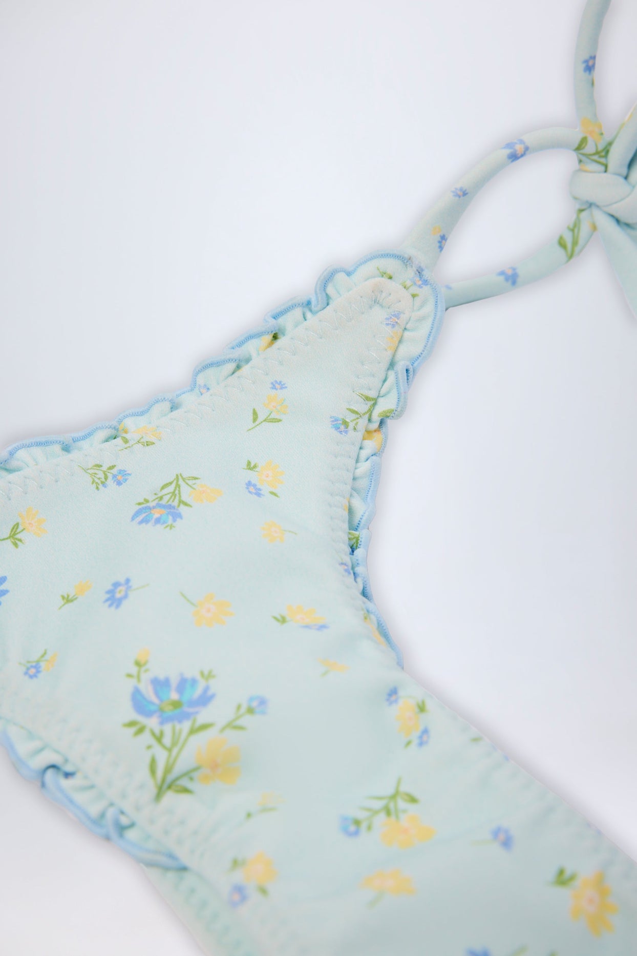 Side-Tie Thong Bikini Bottoms in Blue Floral Print