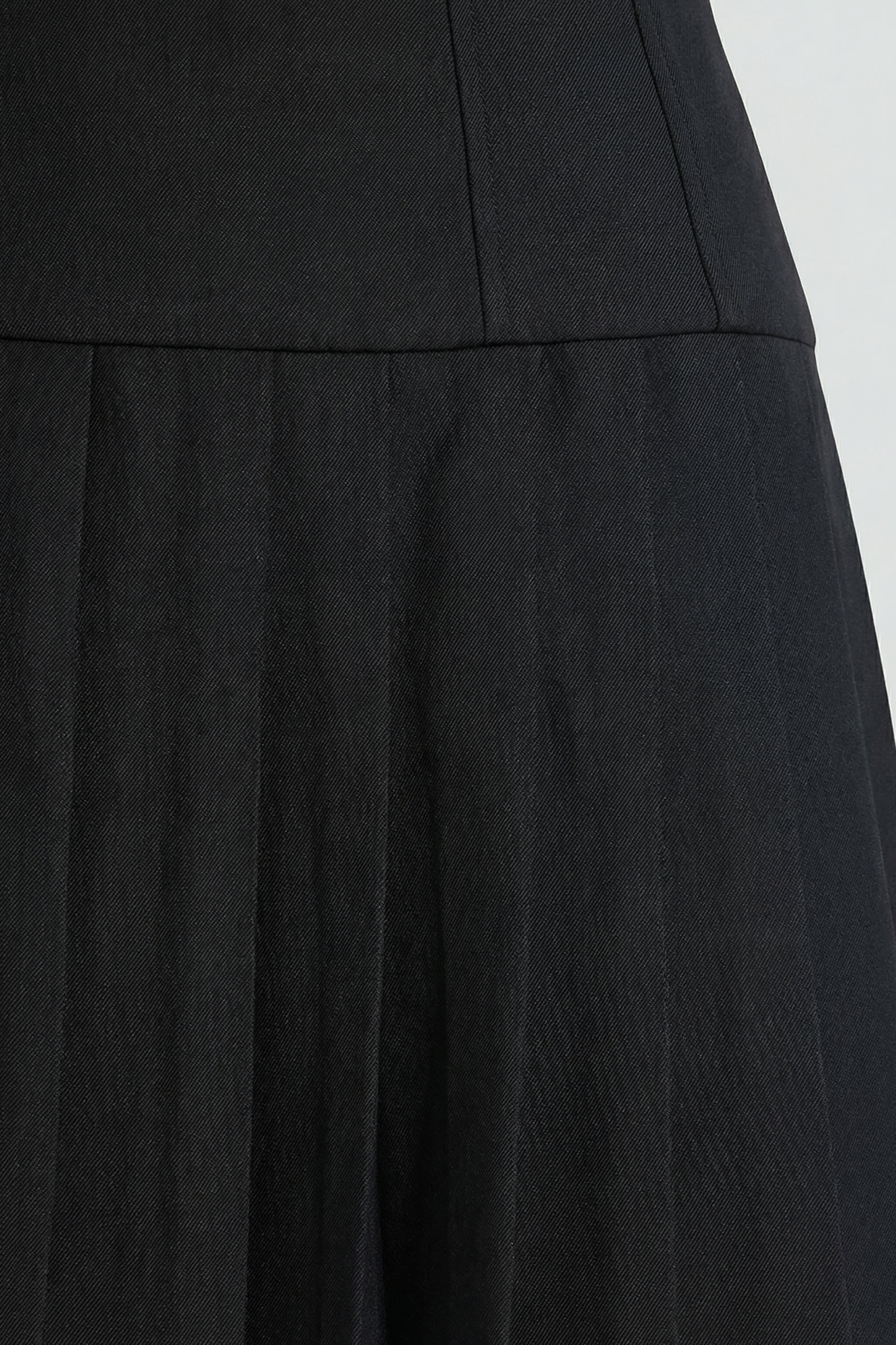 Brushed Twill Drop Waist Kilt Mini Dress in Black