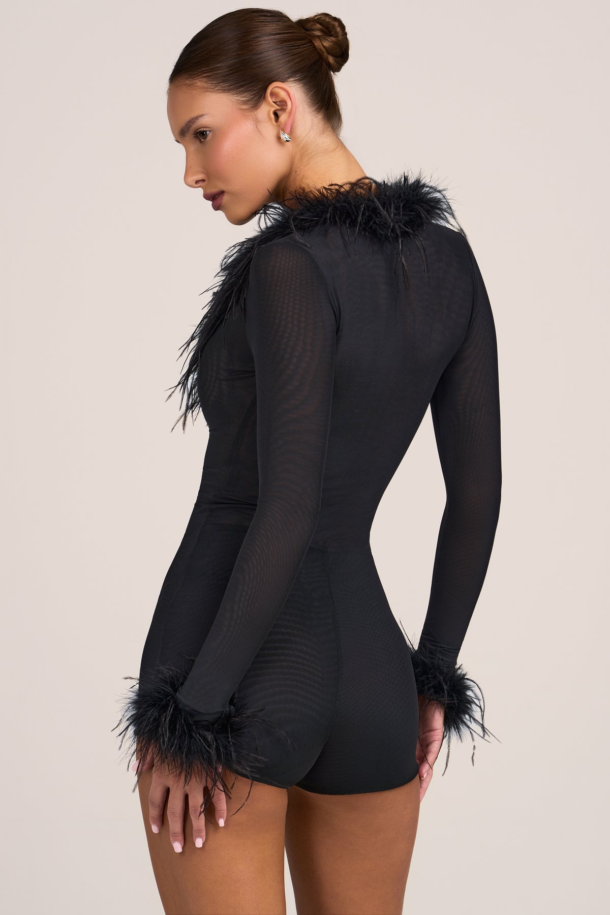Feather-Trim Semi-Sheer Romper in Black