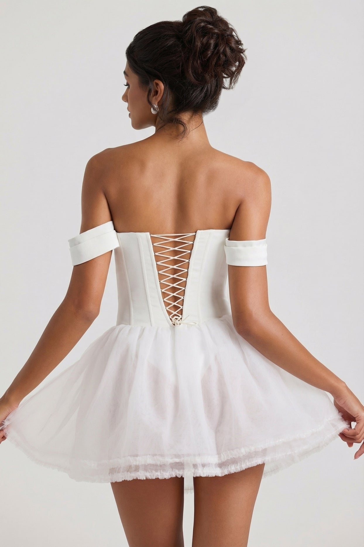 Oh Polly's Meeya wearing the Meredith Mini Dress in White Tulle fabric perfect for bridal showers