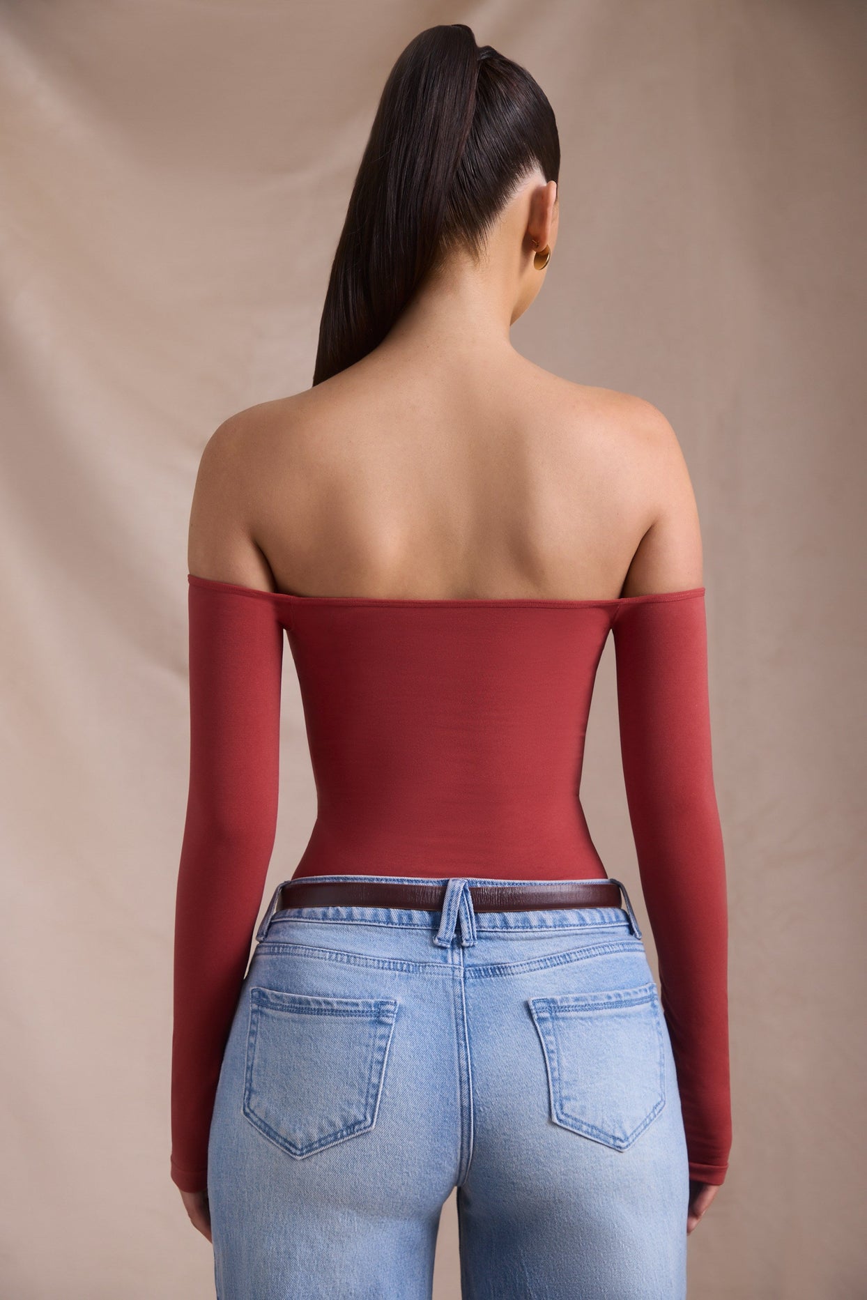 Seamless Off-Shoulder Long-Sleeve Bodysuit in Brick Red