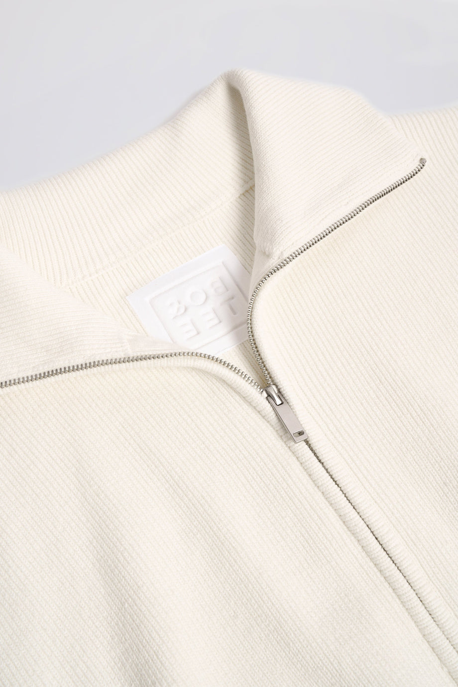 Ribbed Knit Zip-Up Cropped Sweatshirt in Ivory