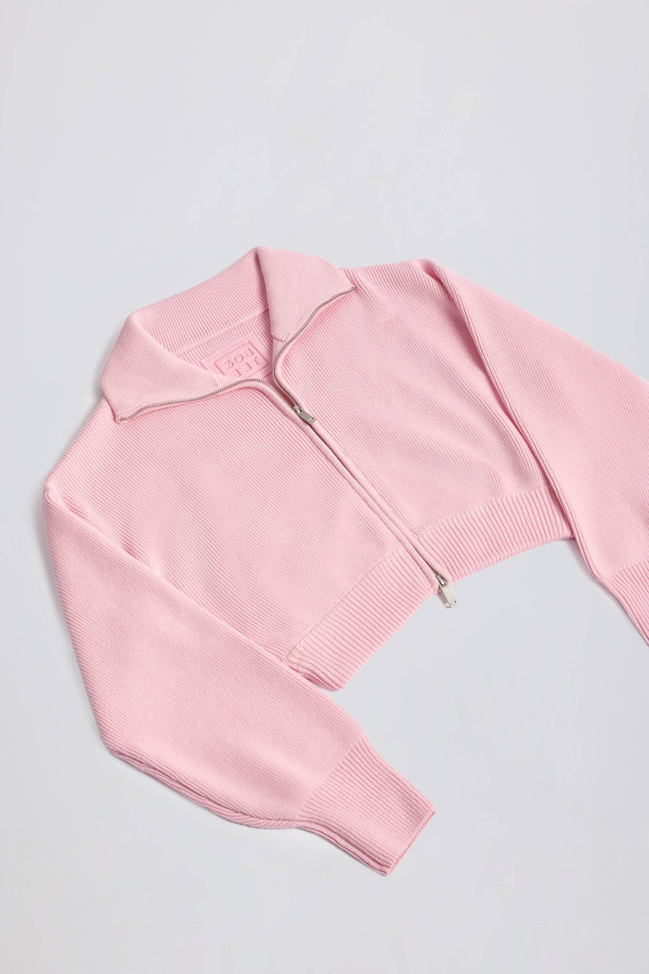 Ribbed-Knit Cropped Zip-Up Sweatshirt in Pale Pink