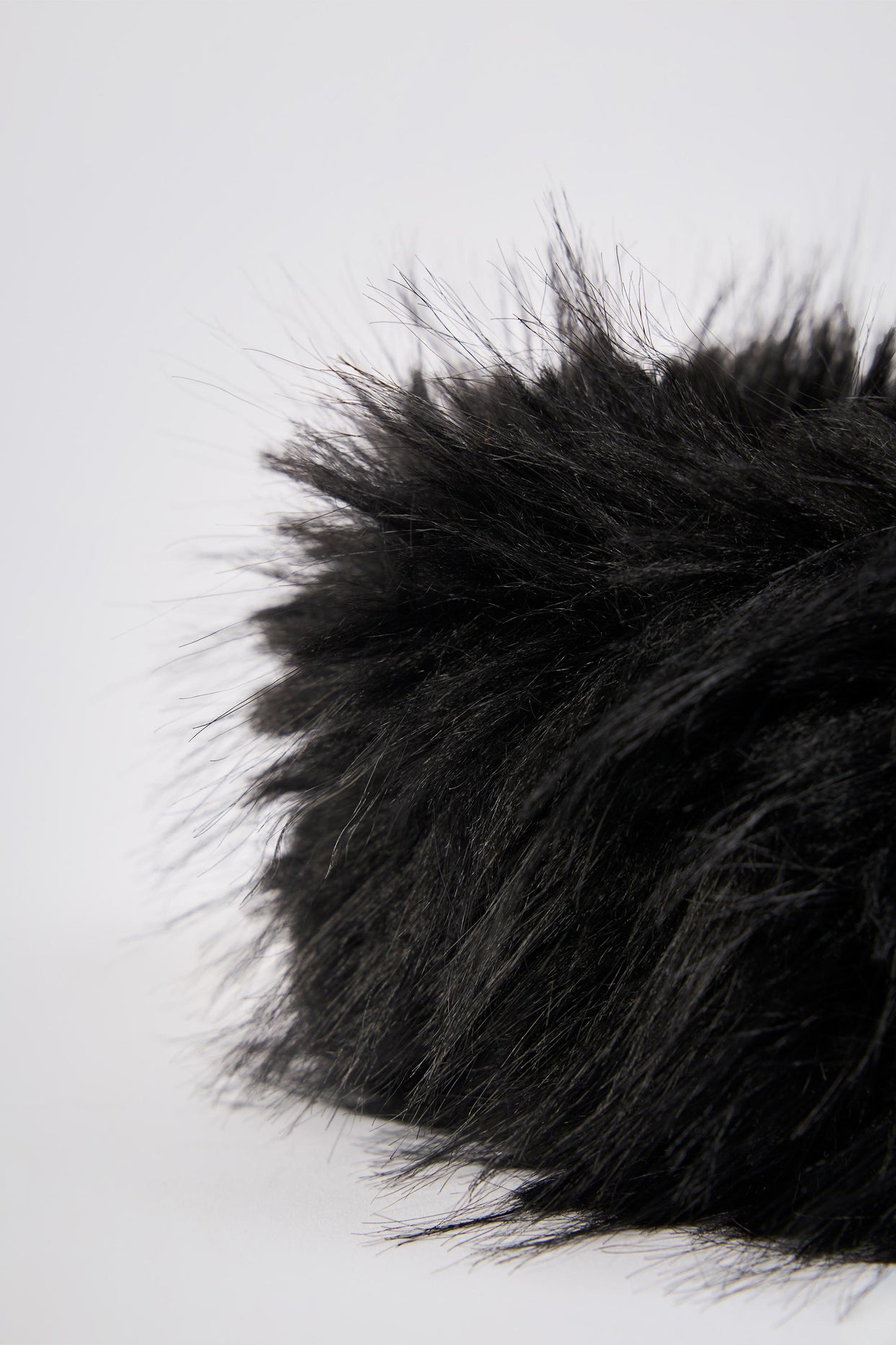 Faux-Fur Wrist Warmers in Black