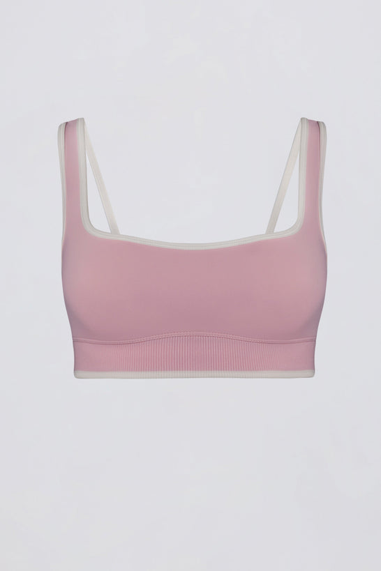 حمالة صدر رياضية ناعمة ومتباينة اللون باللون الوردي البودري