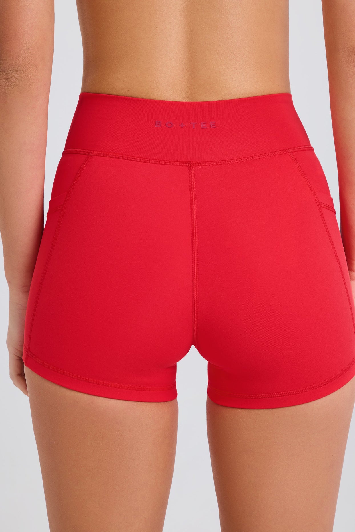 Soft Active Crossover Pocket Shorts in Strawberry Red