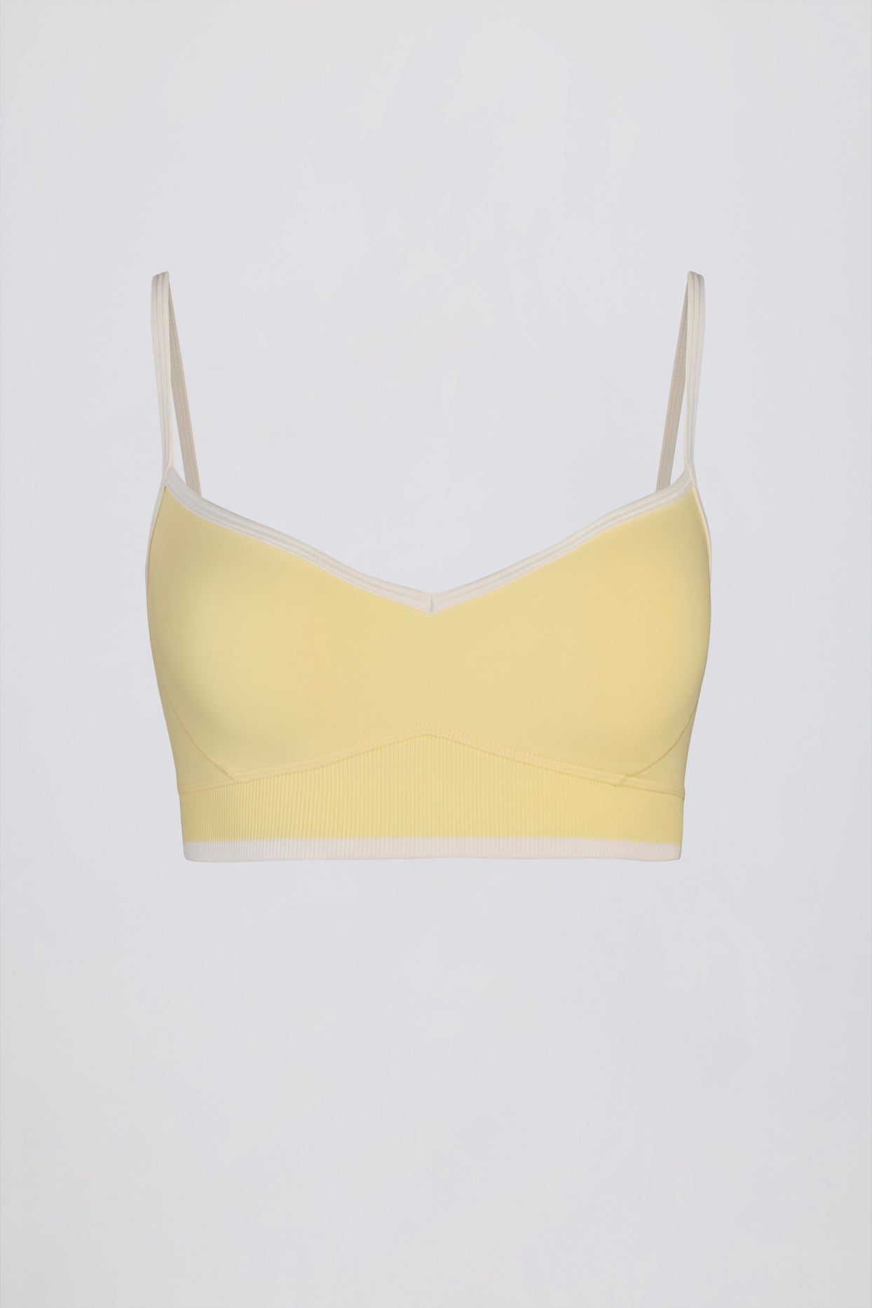 حمالة صدر رياضية ناعمة وفعّالة بفتحة صدر على شكل قلب بلون أصفر ناعم