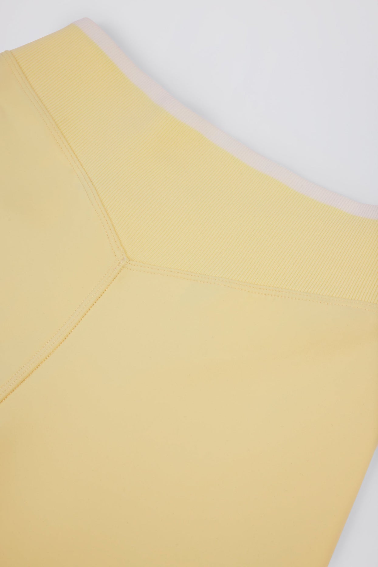 Soft Active Wrapover Contrast Mini Shorts in Soft Yellow