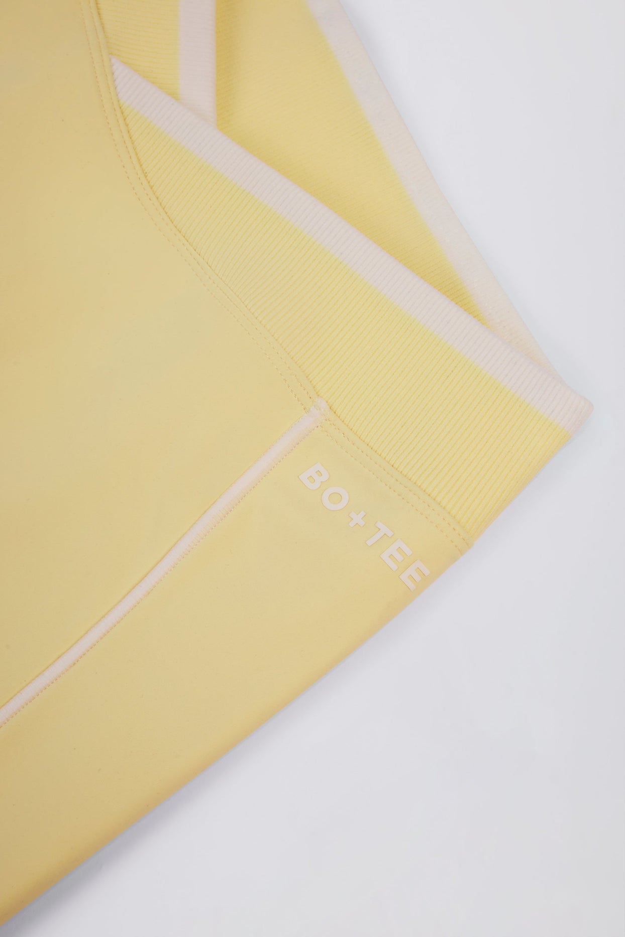 Soft Active Wrapover Contrast Mini Shorts in Soft Yellow