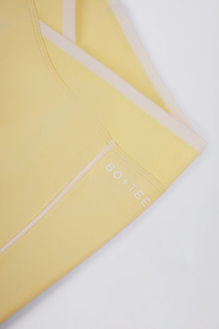 Soft Active Wrapover Contrast Mini Shorts in Soft Yellow