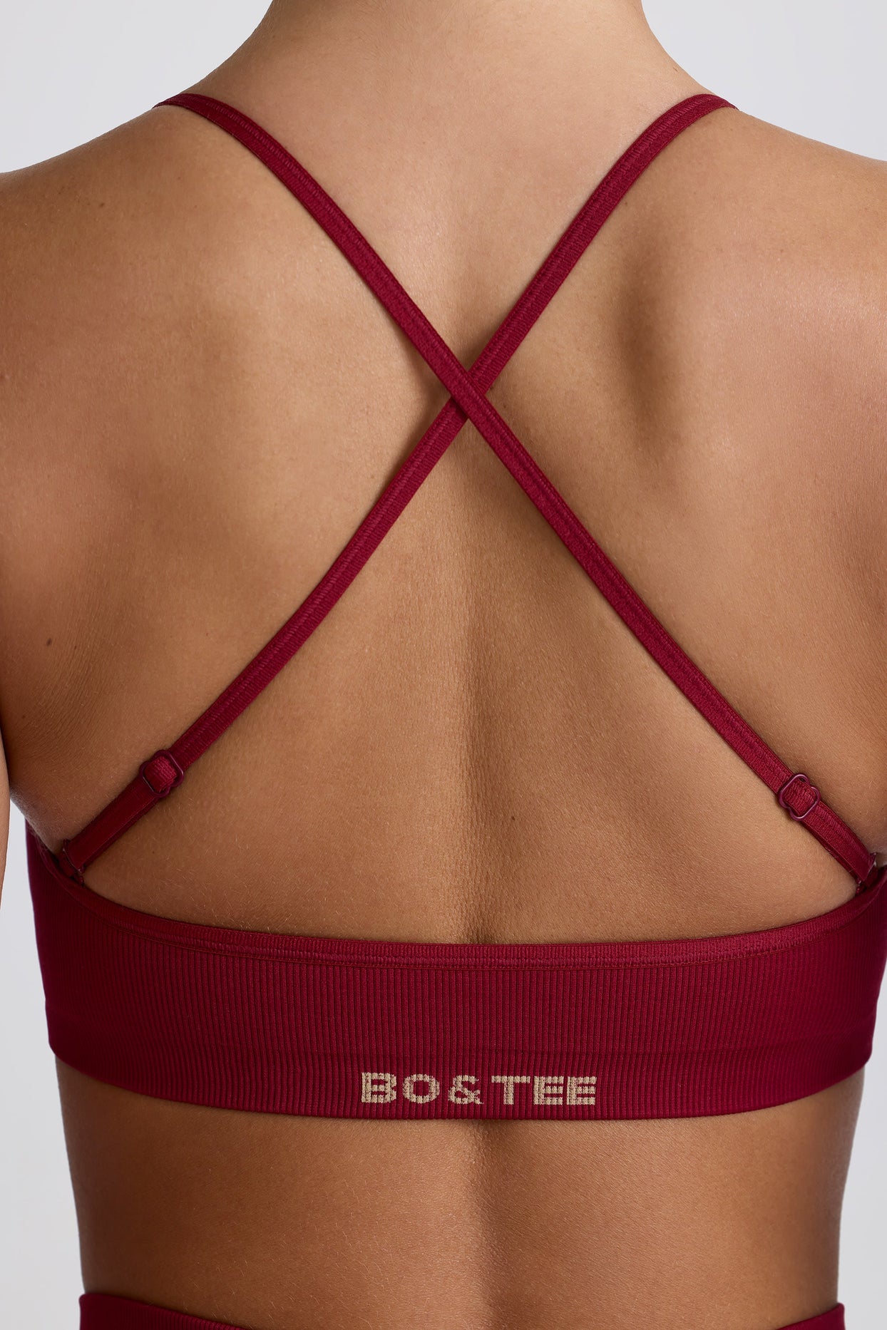 Super Sculpt Seamless Cross-Back Sports Bra in Burgundy