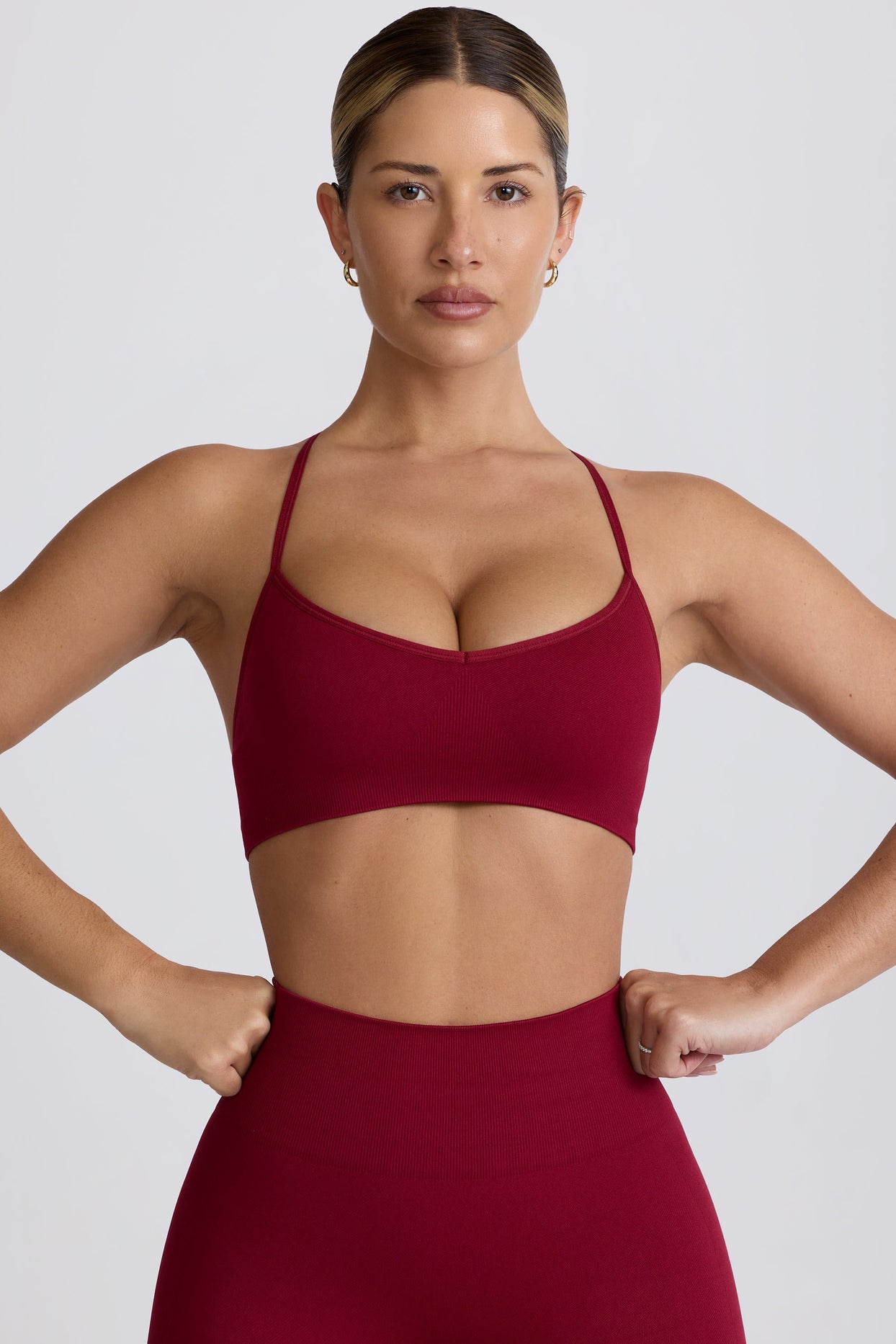 Super Sculpt Seamless Cross-Back Sports Bra in Burgundy