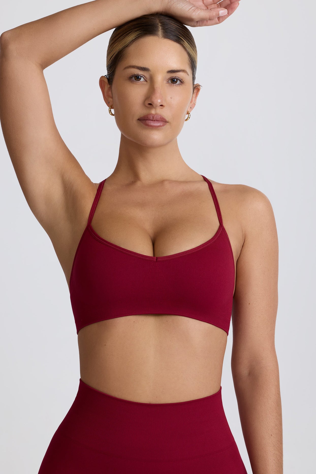 Super Sculpt Seamless Cross-Back Sports Bra in Burgundy