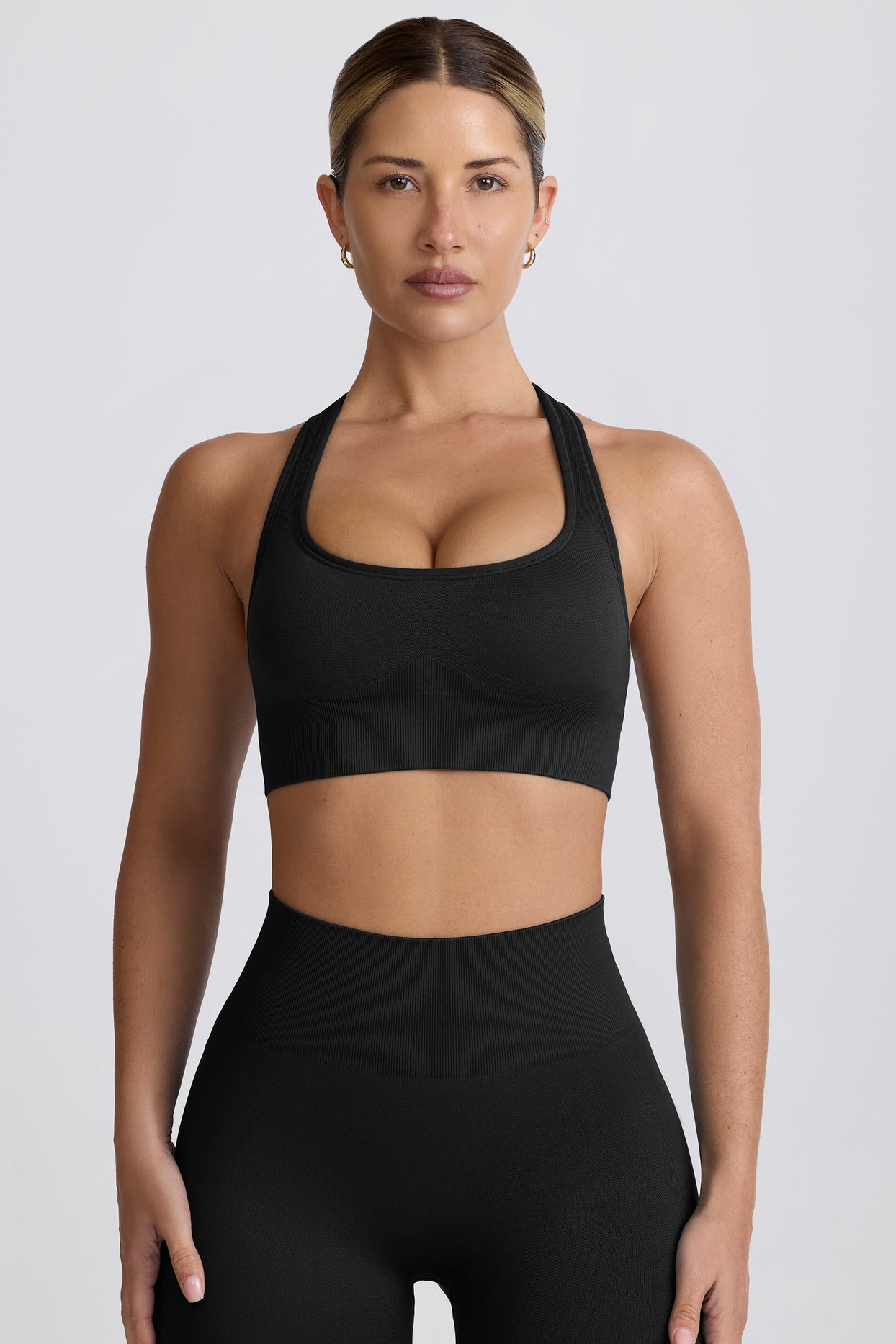 Super Sculpt Seamless T-Back Sports Bra in Black