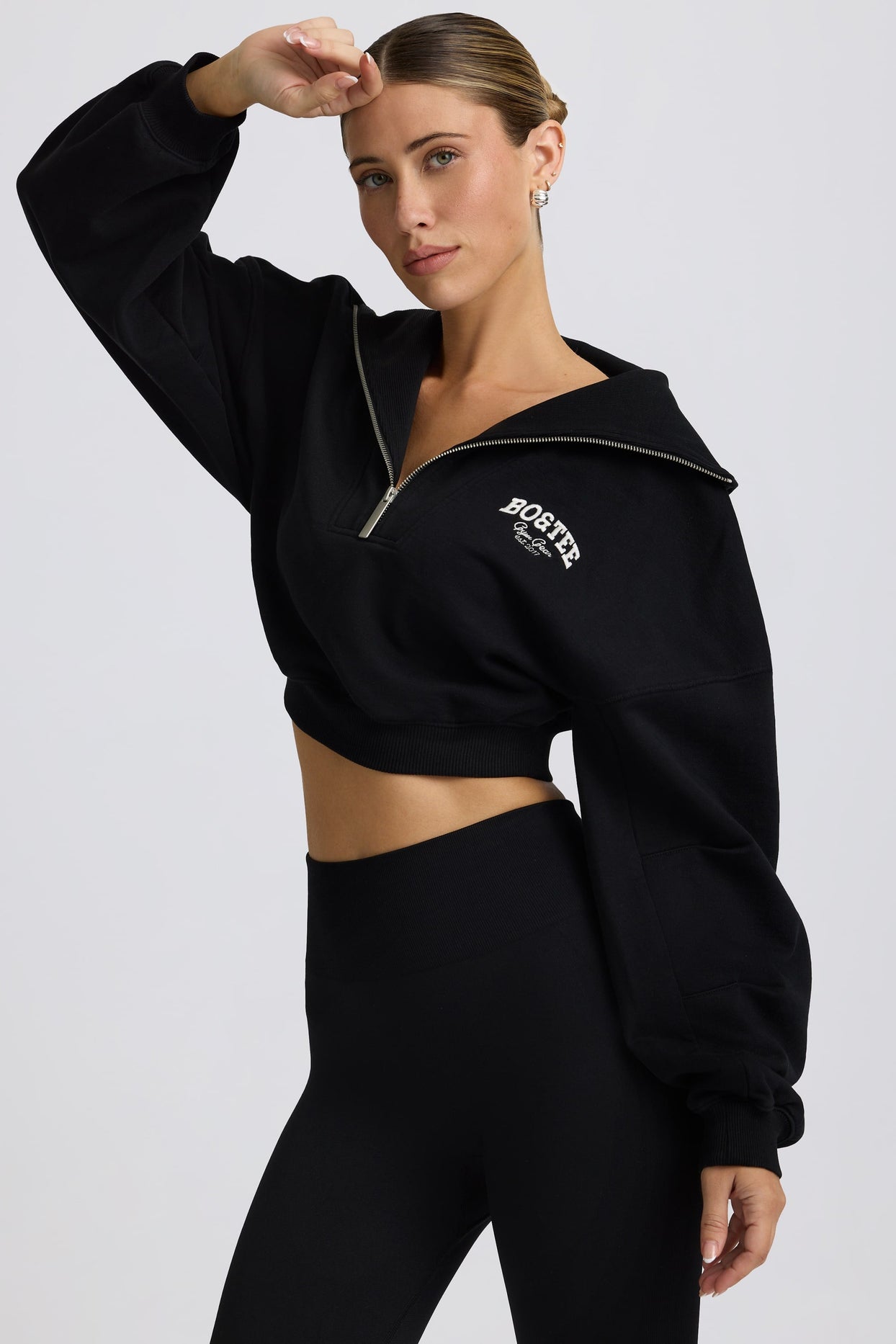 Quarter-Zip Cropped Sweatshirt in Black