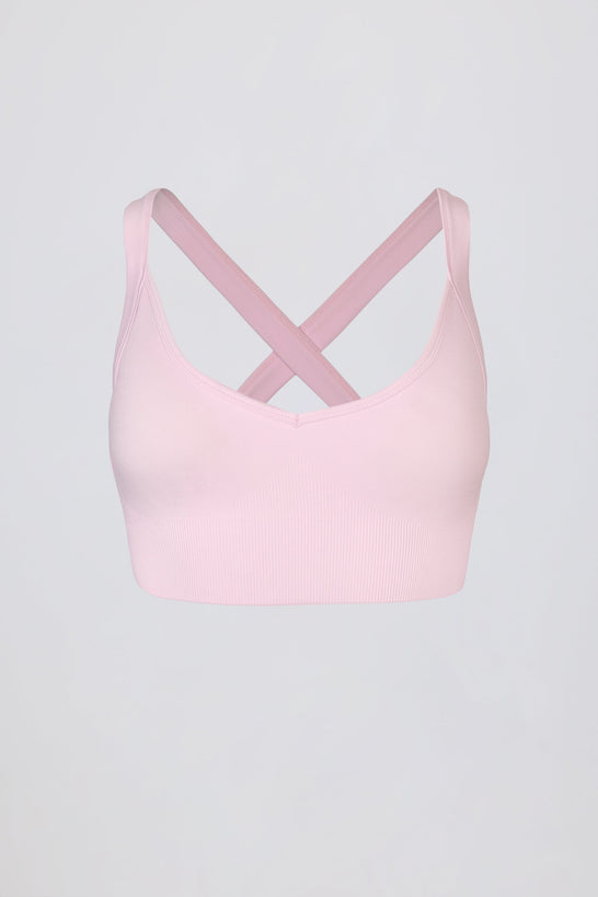 Super Sculpt Seamless Cross-Back Sports Bra in Powder Pink