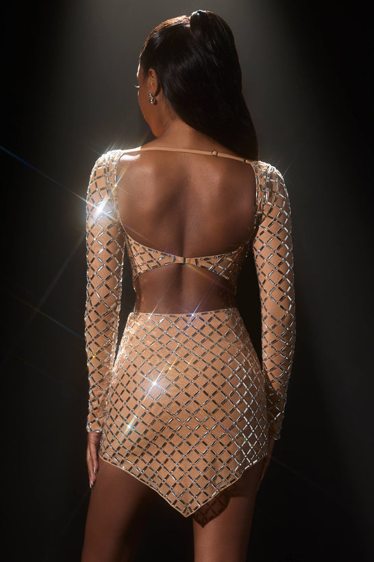 تنورة قصيرة مزينة متوسطة الارتفاع وغير متماثلة باللون اللوزي