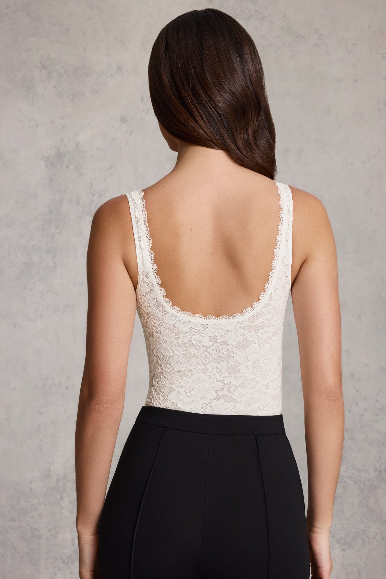 Plunge-Neck Lace Bodysuit in White