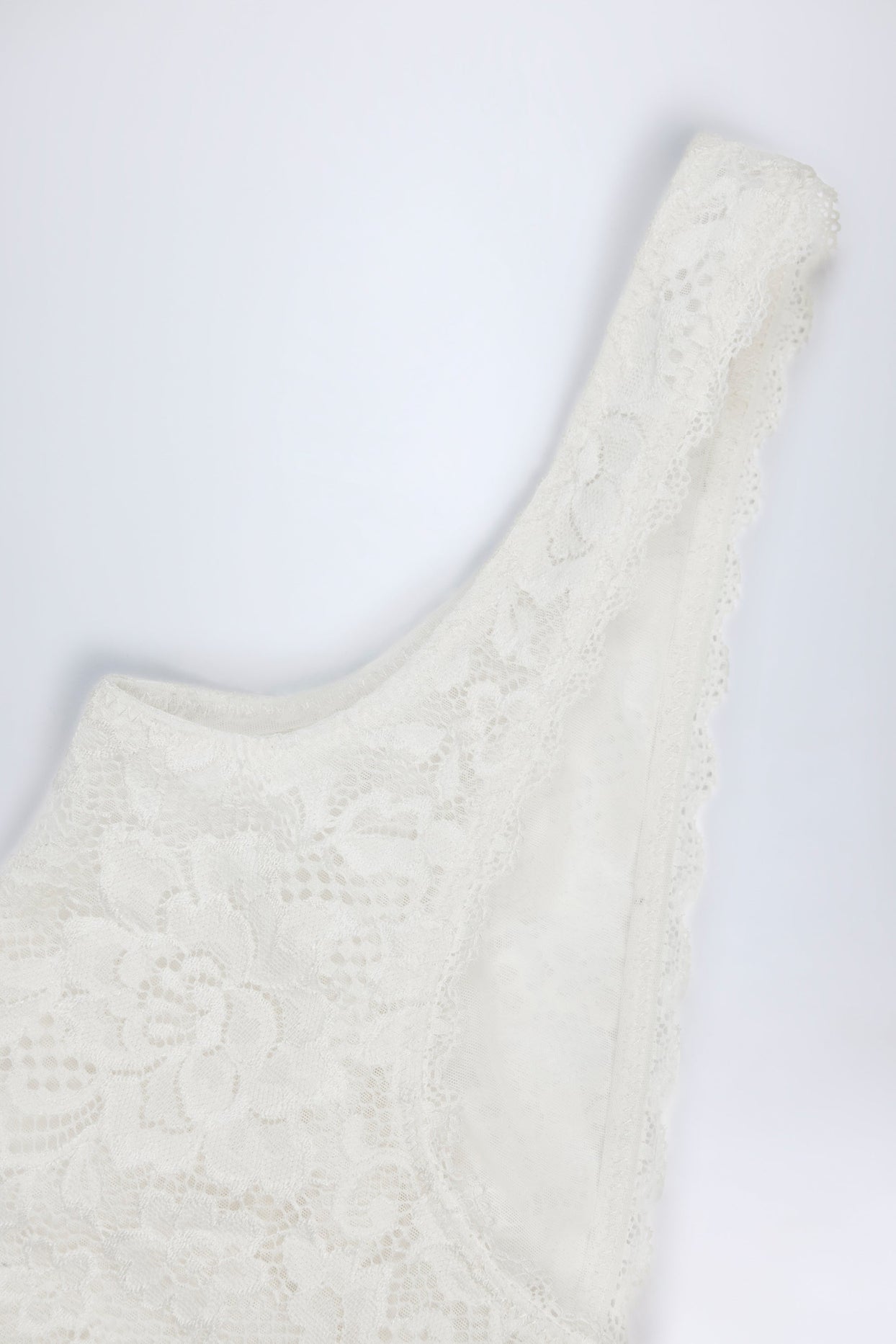 Plunge-Neck Lace Bodysuit in White