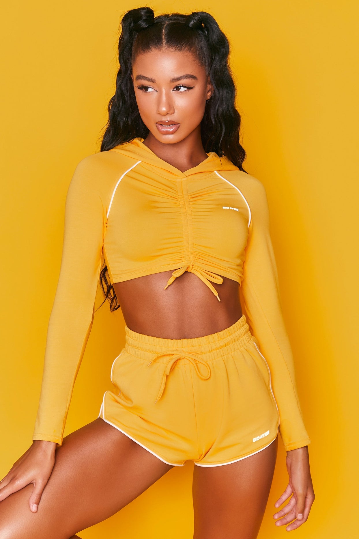 On Track Mini Runner Shorts in Orange