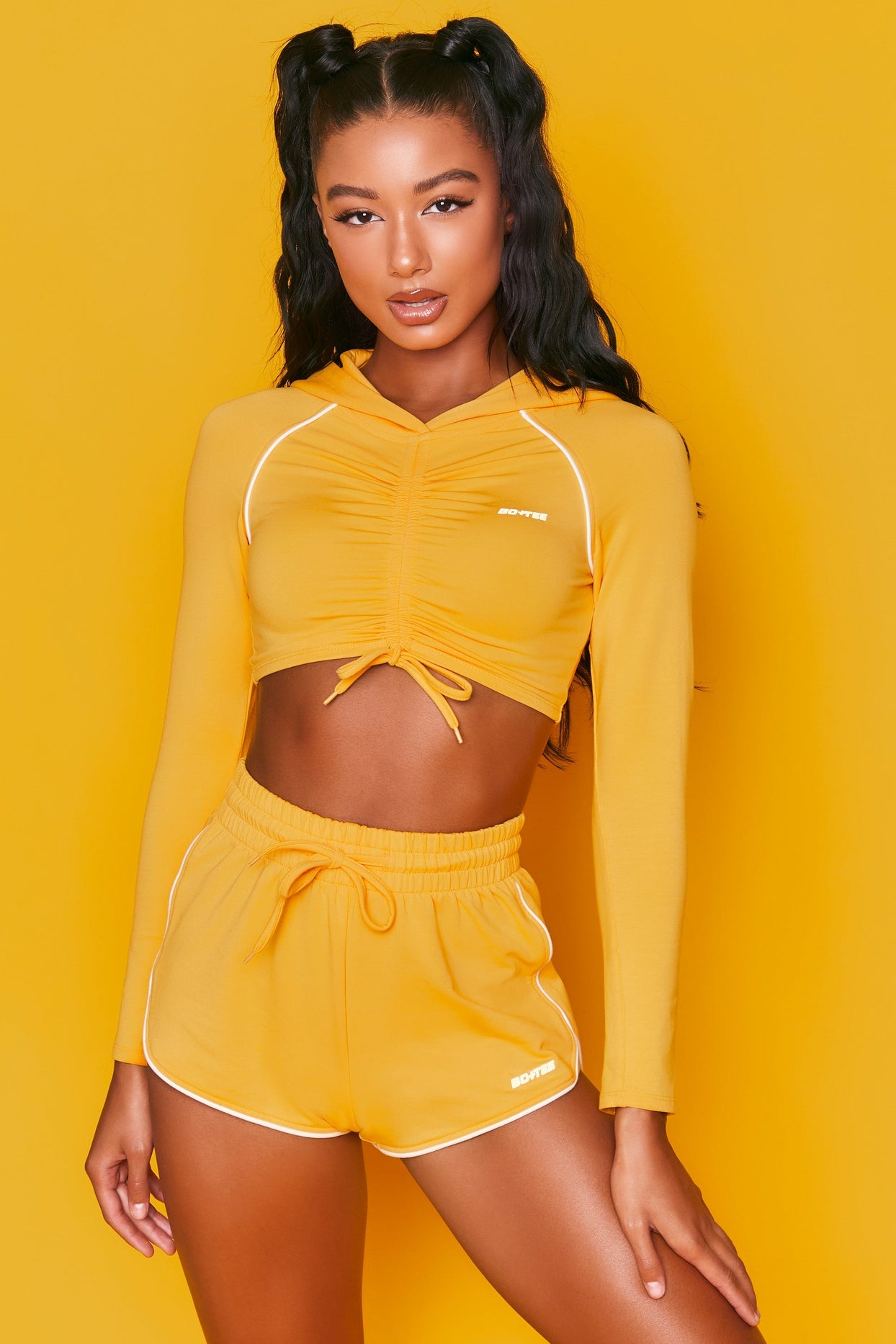 On Track Mini Runner Shorts in Orange